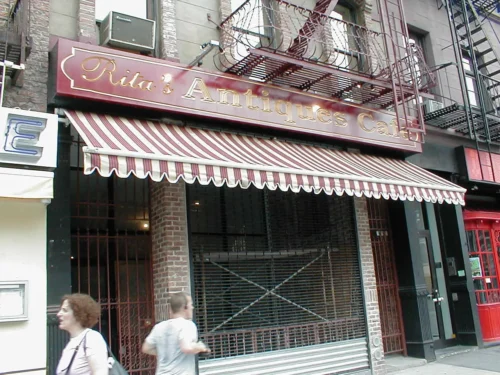 rollout awning and flat sign Rita's