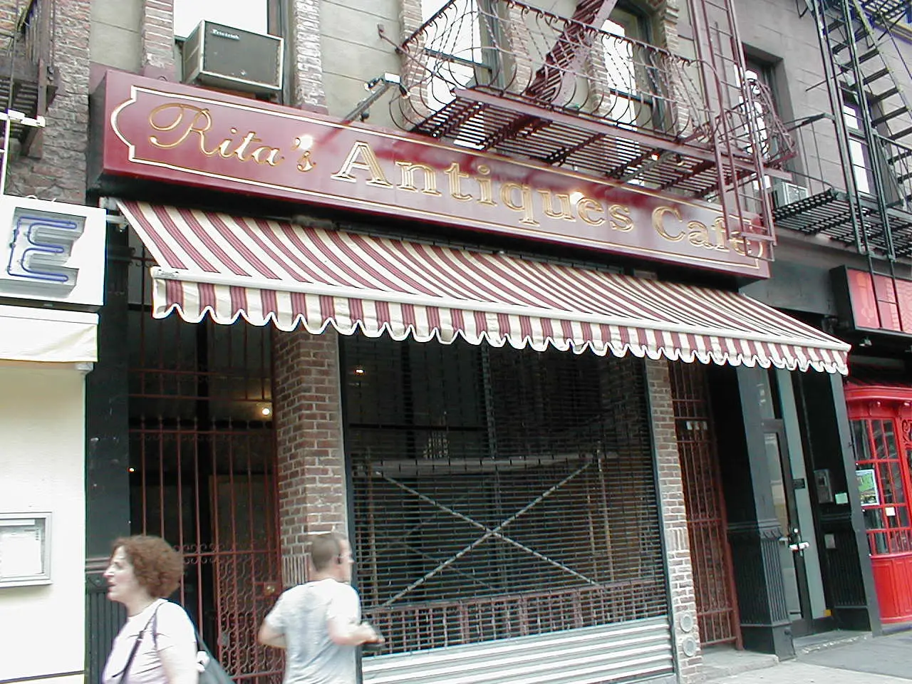 rollout awning and flat sign Rita's