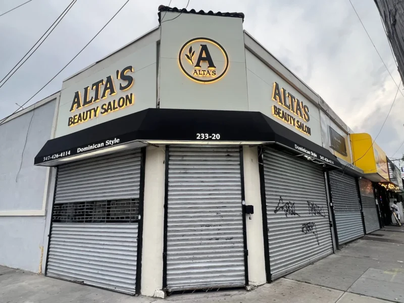 metal signage and black business awnings olympic pita